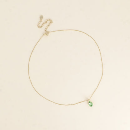Collier orné de cristaux de Swarovski® en forme de goutte - Longueur de chaîne : 38+7 cm - Dimensions du cristal : 7x10 mm - Peridot