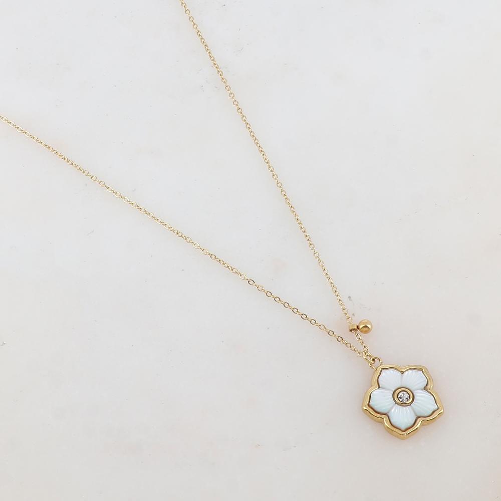 Collier avec une fleur ornée de nacre et un strass blanc 39+7 cm
