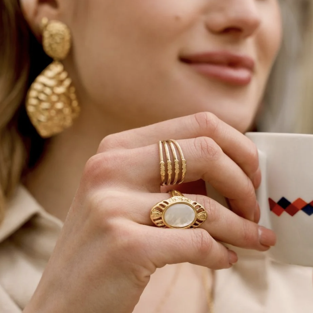 Bague lisse et texturée 4 rangs avec multi petits ronds au milieu