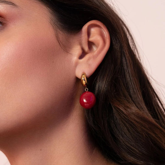 Créoles avec perle en acétate 1,6x 3,6 cm.