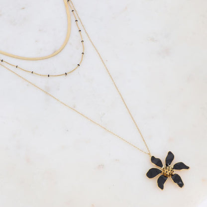 Collier doré avec des petites rondelles et une fleur émaillées noires 40/48/65+5 cm