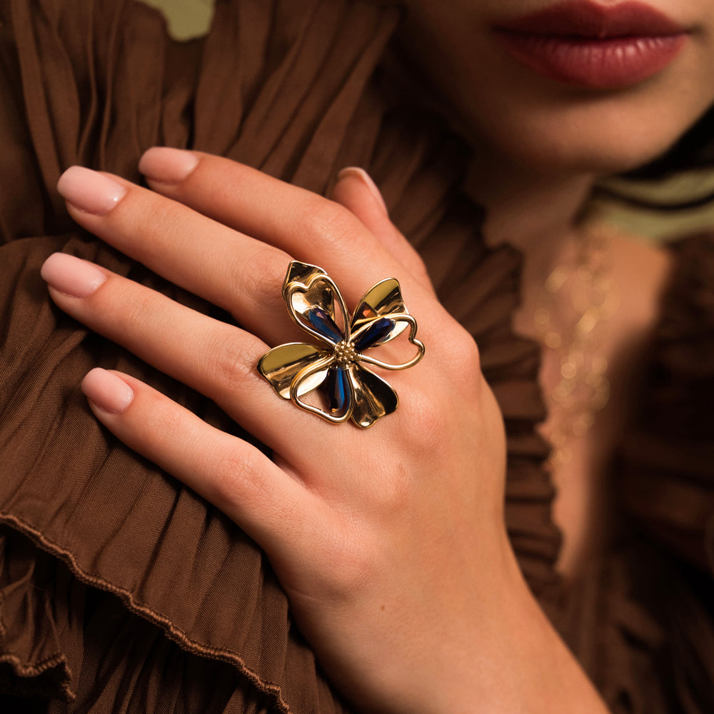 Bague avec pièce forme fleur sertie de perles en pâtes de verre - Bleu
