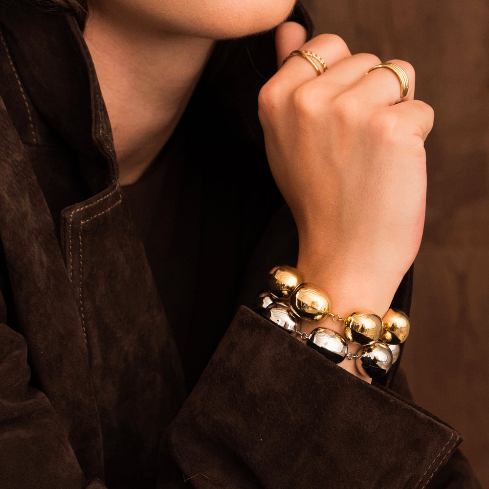Bracelet avec pièces géométriques bombées effet miroir