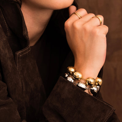 Bracelet avec pièces géométriques bombées effet miroir