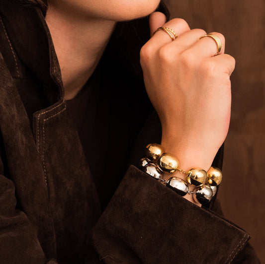 Bracelet avec pièces géométriques bombées effet miroir