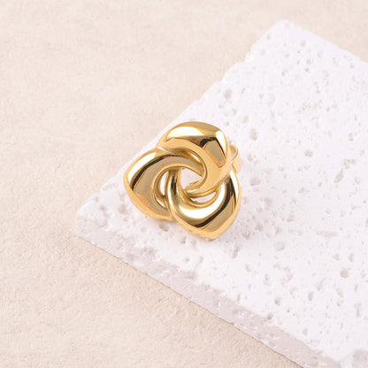 Bague avec pièce graphique ajourée lisse et effet miroir