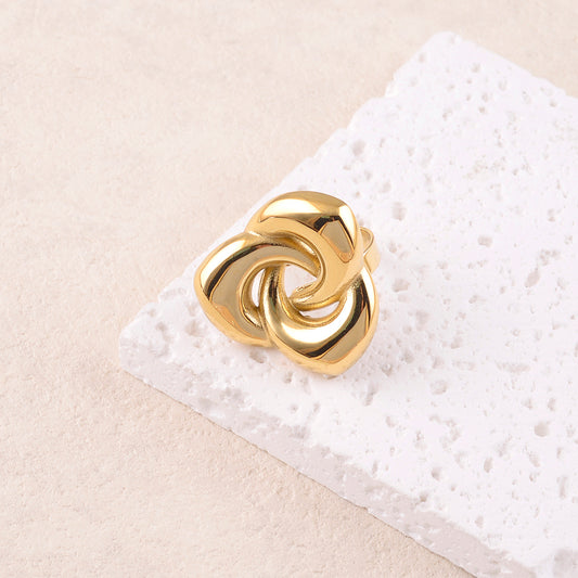 Bague avec pièce graphique ajourée lisse et effet miroir