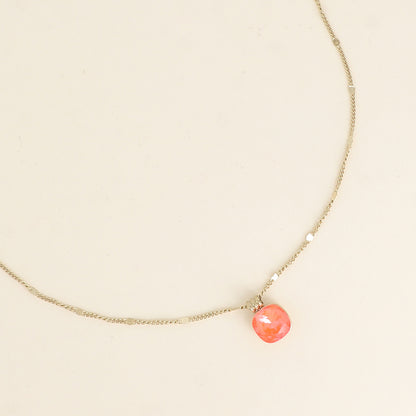 Collier orné de cristaux de Swarovski®. - Longueur de chaîne : 38+7 cm - Dimensions du cristal : 10 x 10 mm - Electric orange