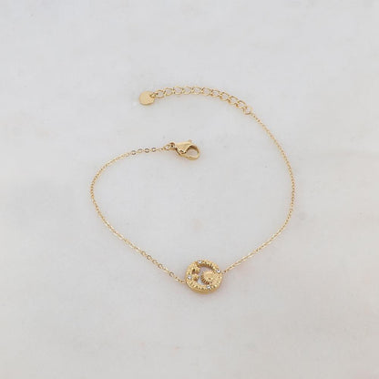 Bracelet avec pièce ronde, nacre, soleil, étoiles, strass