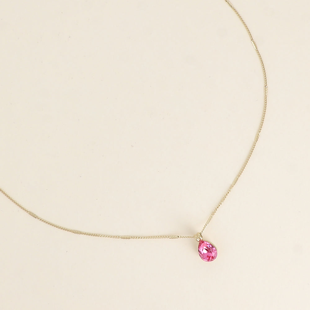 Collier orné de cristaux de Swarovski® en forme de goutte - Longueur de chaîne : 38+7 cm - Dimensions du cristal : 7x10 mm - Rose
