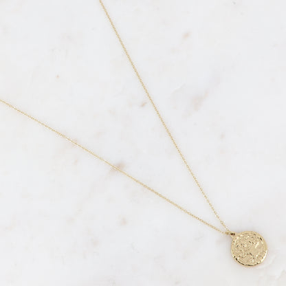 Collier doré composé d'un pendentif rond avec un motif arbre de vie 40+5 cm
