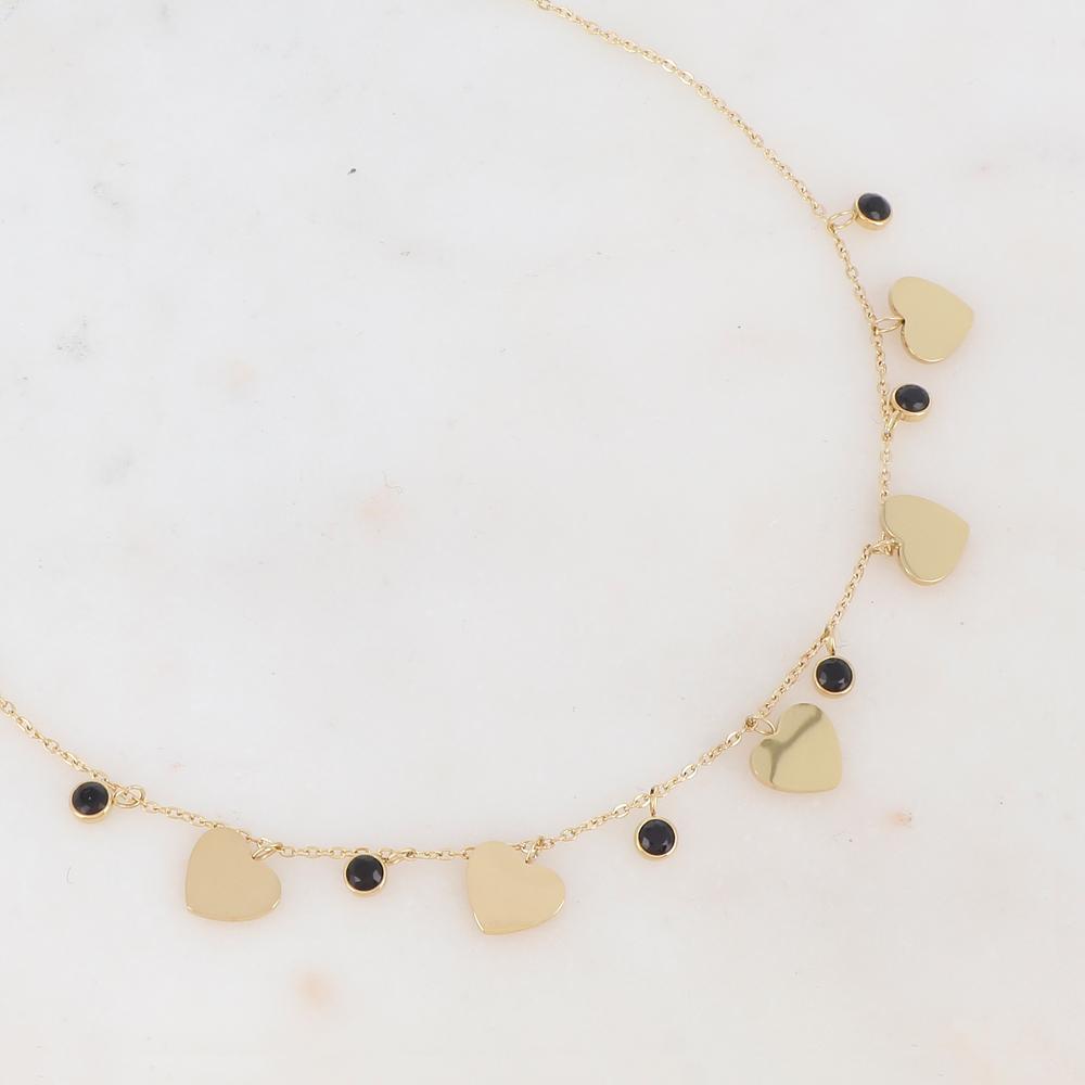 Collier doré composé de pendants cœur et de strass noirs 41+5 cm