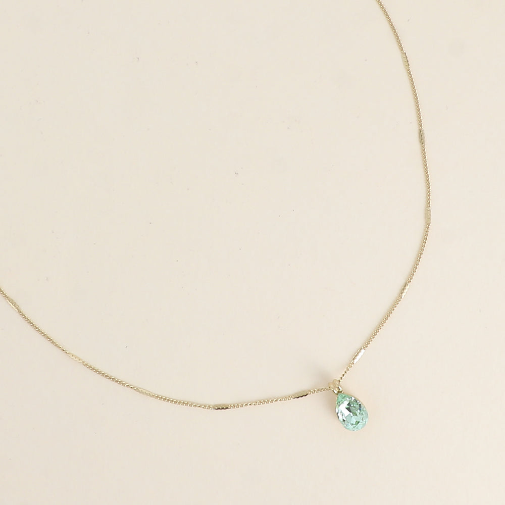 Collier orné de cristaux de Swarovski® en forme de goutte - Longueur de chaîne : 38+7 cm - Dimensions du cristal : 7x10 mm - Chrysolite