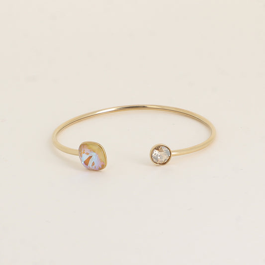 Jonc orné de cristaux de Swarovski® 10 mm et SS29 - Hauteur du jonc: 11 mm - Dimension du cristal 1: 10x10 mm - Diamètre du cristal 2: 7 mm - Ochre delite and Golden shadow
