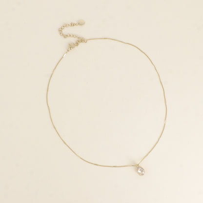 Collier orné de cristaux de Swarovski® en forme de goutte - Longueur de chaîne : 38+7 cm - Dimensions du cristal : 7x10 mm - Golden shadow