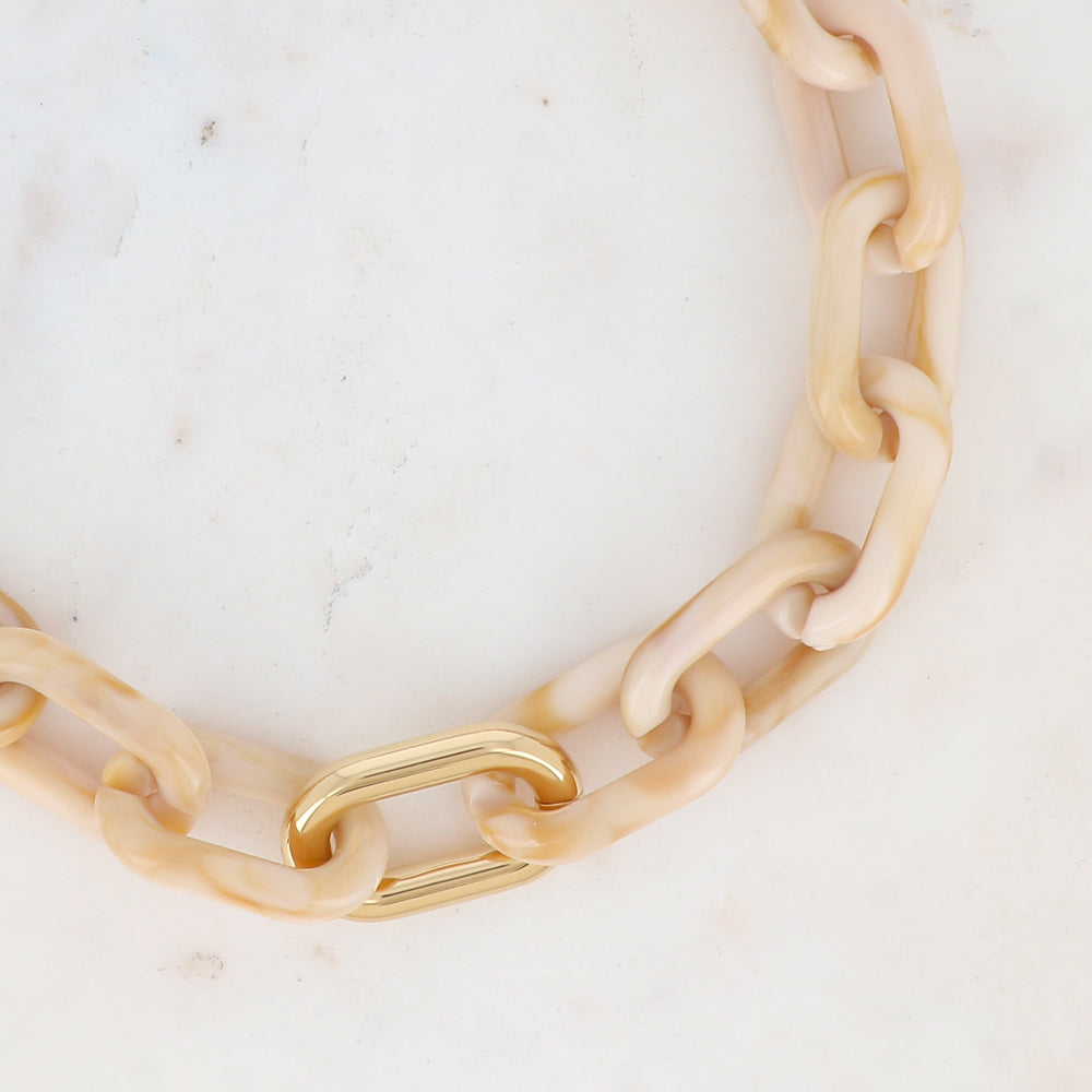 Collier avec mousqueton et résine ovale beige 46+5 cm