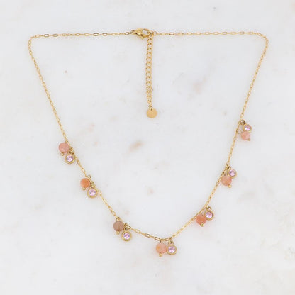 Collier doré embelli de pierres et de strass roses 38+5 cm