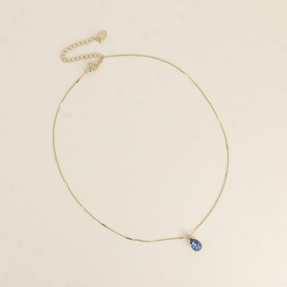 Collier orné de cristaux de Swarovski® en forme de goutte - Longueur de chaîne : 38+7 cm - Dimensions du cristal : 7x10 mm - Denim blue