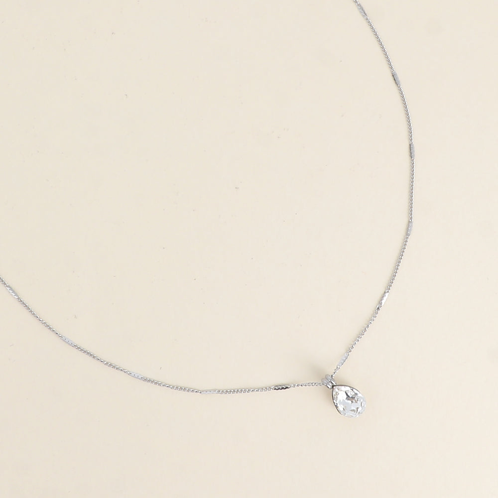 Collier en rhodium orné de cristaux de Swarovski® en forme de goutte - Longueur de chaîne : 38+7 cm - Dimensions du cristal : 7x10 mm - Crystal