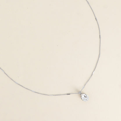 Collier en rhodium orné de cristaux de Swarovski® en forme de goutte - Longueur de chaîne : 38+7 cm - Dimensions du cristal : 7x10 mm - Crystal
