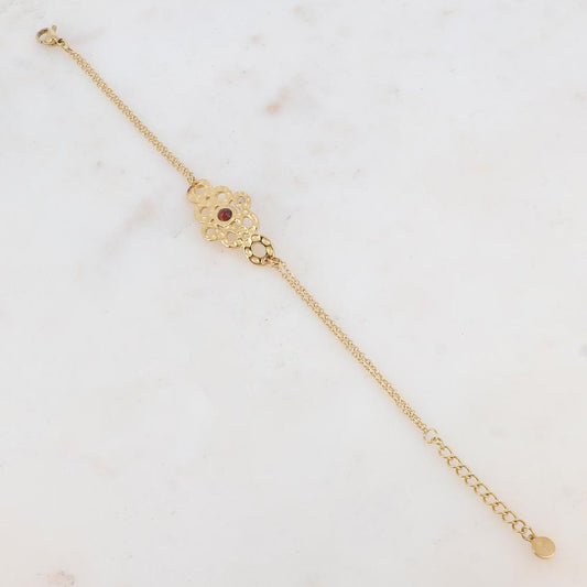 Bracelet avec pièce ajourée de façon muli-ronds, pierre naturelle