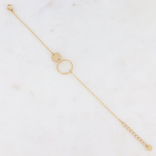 Bracelet avec pièce ronde et anneau, effet martelé