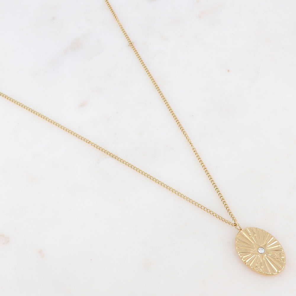 Collier doré composé d'un pendentif ovale avec un motif étoile et un strass blanc 36+7 cm