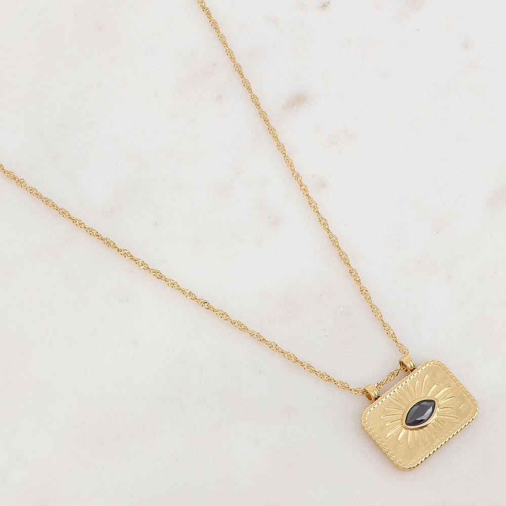 Collier doré avec un pendentif rectangulaire avec un motif fleur et un strass noir 38+5 cm