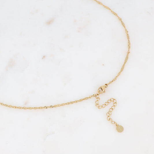 Collier sur chaîne doré composé d'une pièce rectangulaire motif serpent ornée de strass blancs 40+5 cm