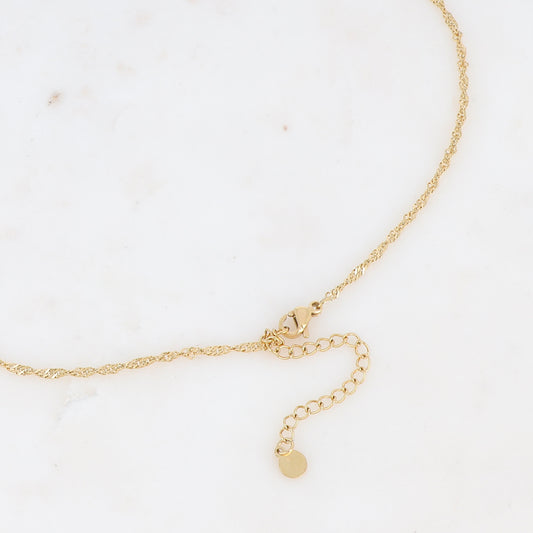 Collier sur chaîne doré composé d'une pièce rectangulaire motif serpent ornée de strass blancs et une perles en pierre naturelle onyx 40+5 cm