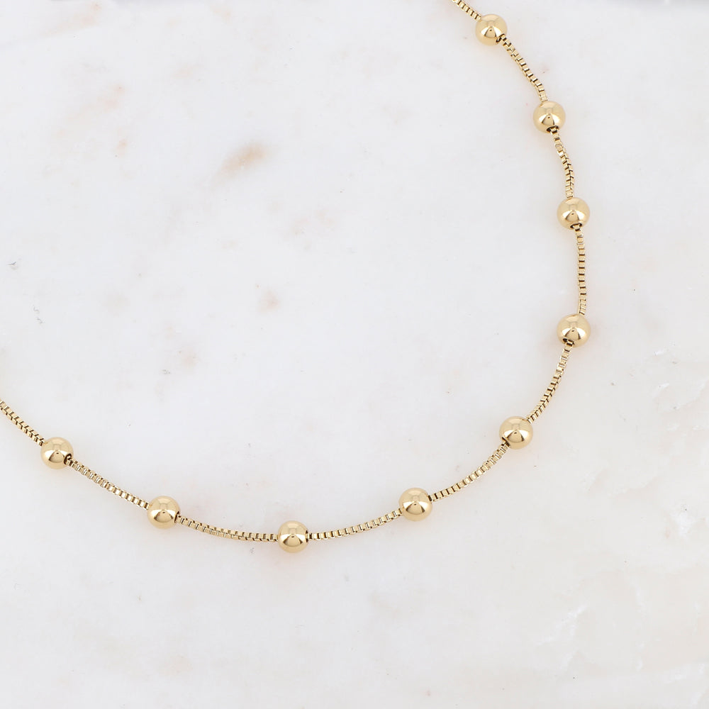 Collier doré avec boules lisses 40+5 cm