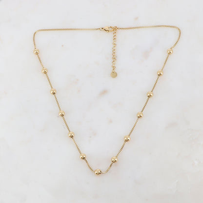Collier doré avec boules lisses 40+5 cm