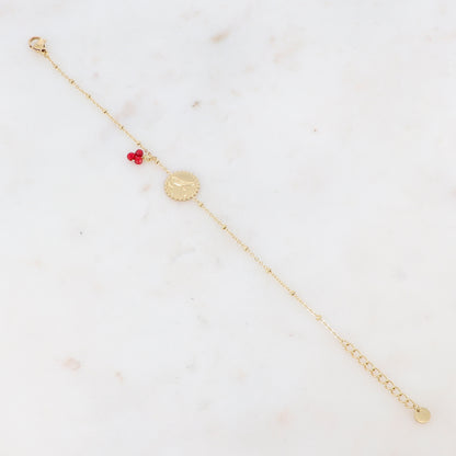 Bracelet avec 3 petites perles en pierres naturelles et pampille graphique