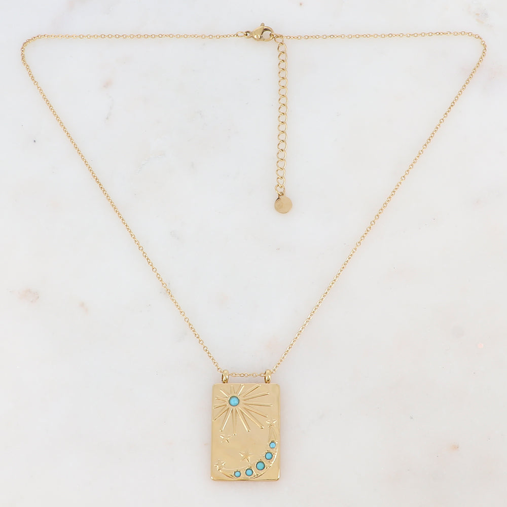 Collier doré avec une pampille rectangulaire ornée d'étoile, d'un soleil et d'une lune et de strass turquoises(40+5CM)