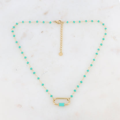 Collier doré avec perles en pâtes de verre turquoises et un pendentif en anneau ovale embelli d'un email turquoise 39,5+5 cm