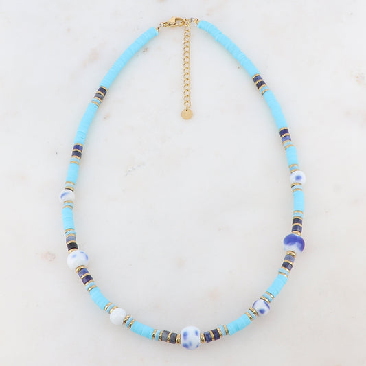 Collier doré avec des perles en céramique, des perles heishi et des pierres naturelles bleues 39+5 cm