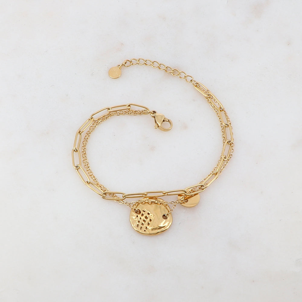 Bracelet trois rangs avec 2 pièces rondes ajourées : lisse et ondulée