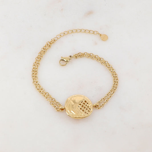 Bracelet avec pièce ronde ajourée, effet ondulé