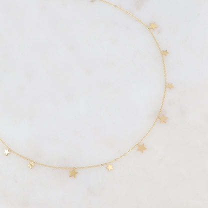 Collier doré orné de pampilles étoiles 39+5 cm