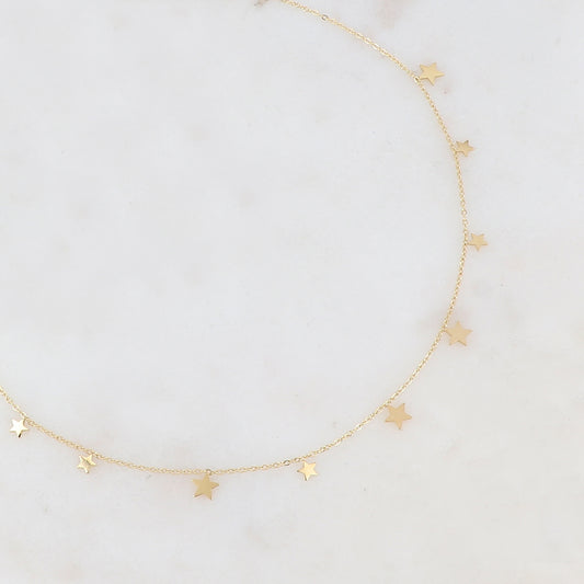 Collier doré orné de pampilles étoiles 39+5 cm