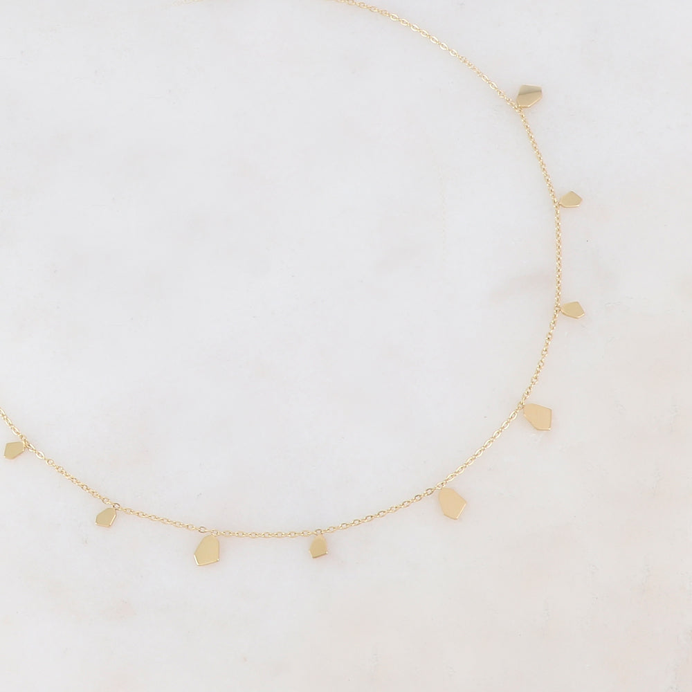 Collier doré orné de pampilles géométriques 39+5 cm