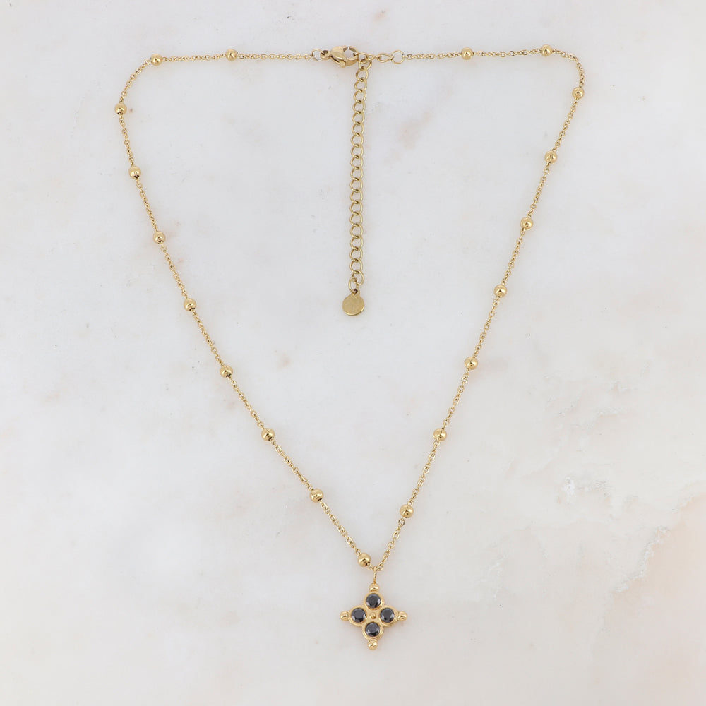Collier doré composé de petites boules et d'un pendentif embelli de strass noirs 38+7 cm