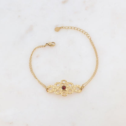 Bracelet avec pièce ajourée de façon muli-ronds, pierre naturelle