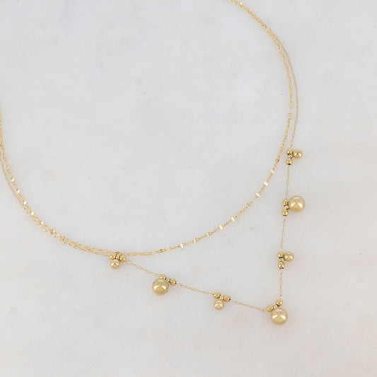 Collier doré double rangs composé de multi-boules 40/43+5 cm