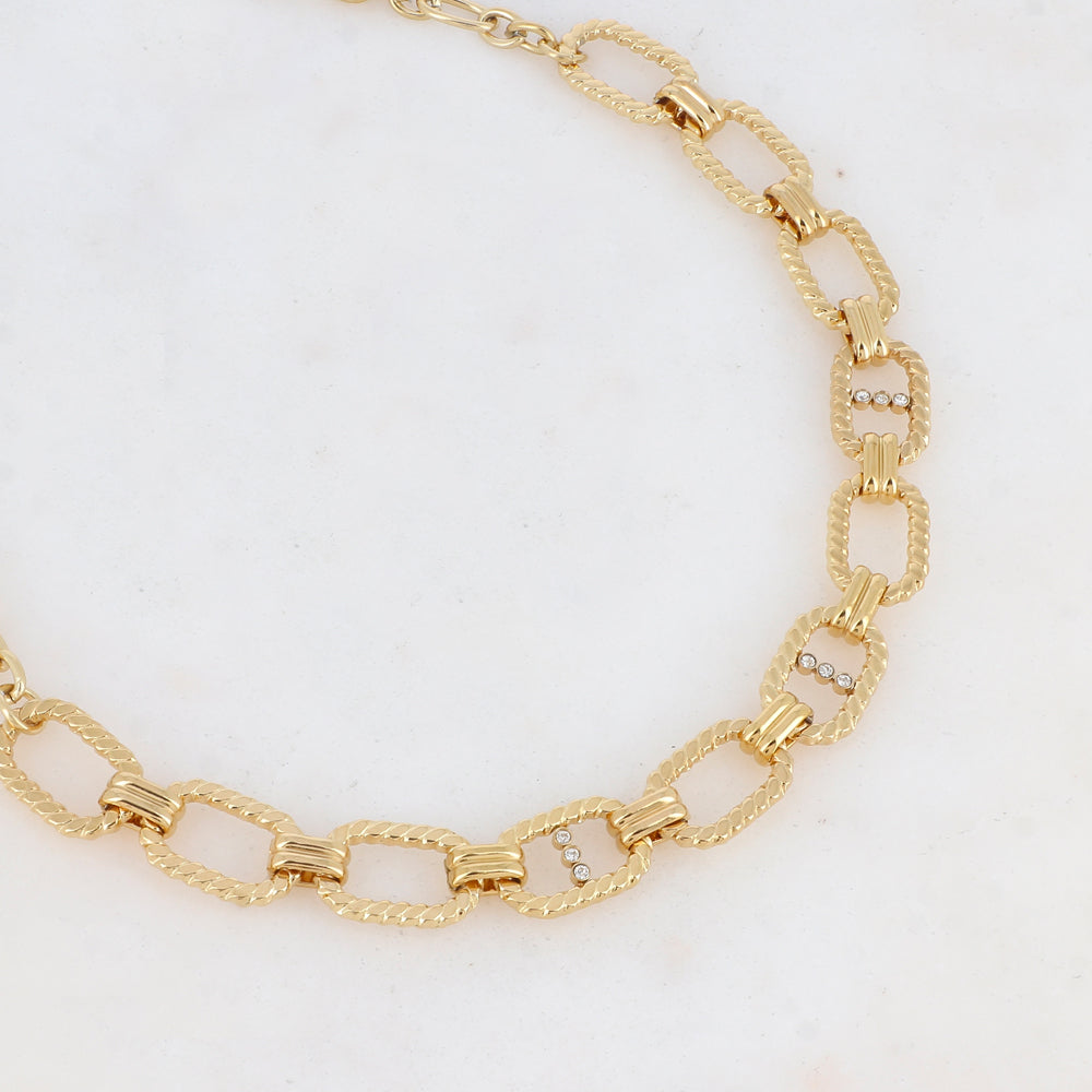 Collier en maille doré embelli de multi-anneaux et de strass blancs 40+5 cm