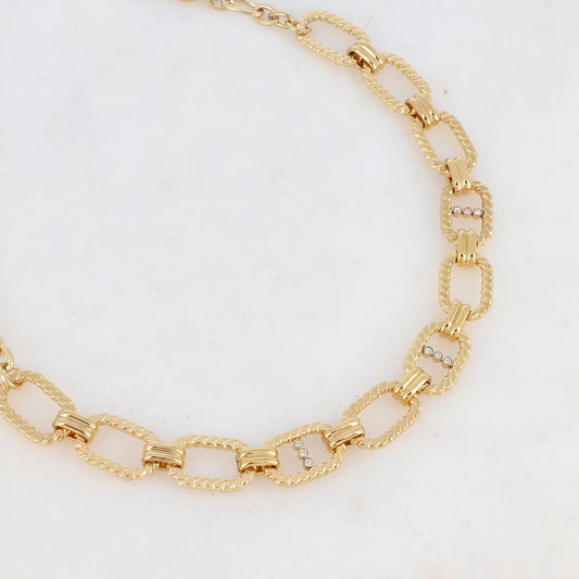 Collier en maille doré embelli de multi-anneaux et de strass blancs 40+5 cm