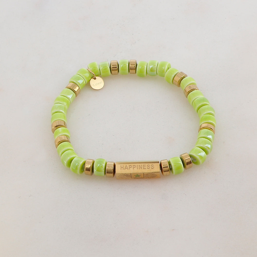 Bracelet élastique avec céramique, pièce géométrique en 5 faces