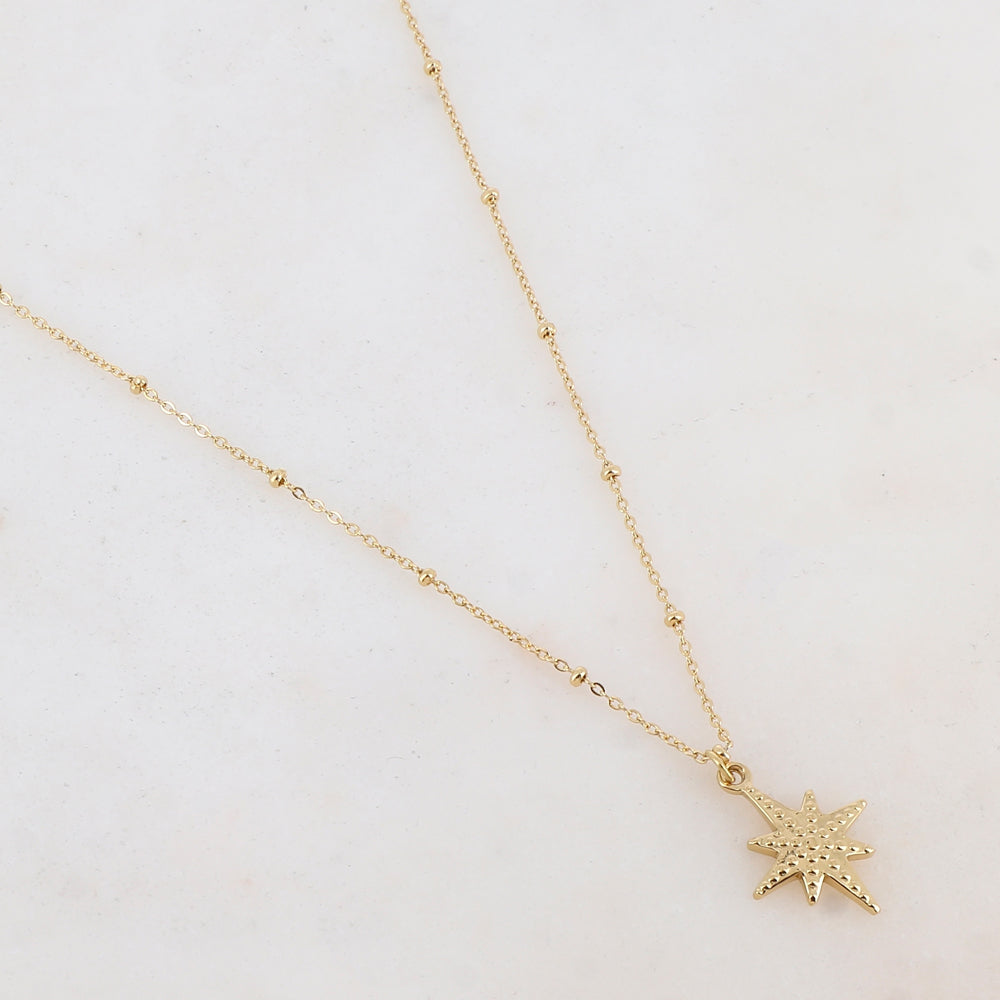 Collier doré avec un pendentif étoile du nord 38+7 cm