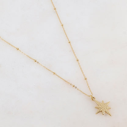 Collier doré avec un pendentif étoile du nord 38+7 cm