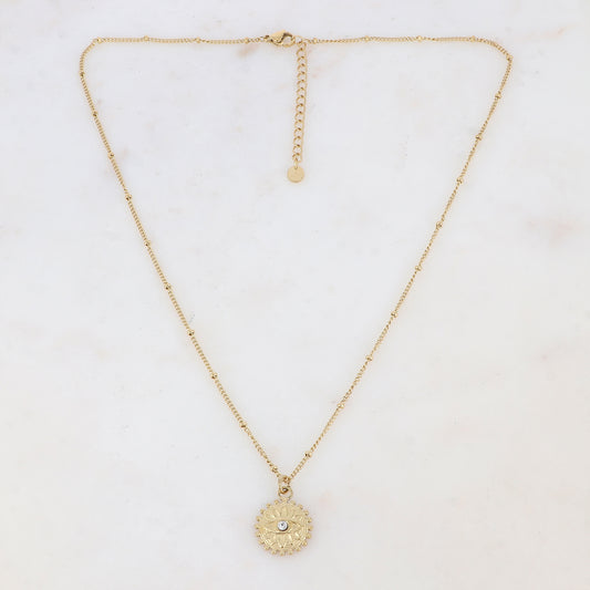 Collier doré avec un pendentif rond motif œil, strass blanc 45+5 cm